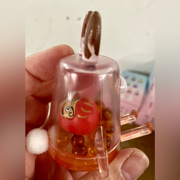 Designer Toy “Lucky too”.  Beads inside including a Daruma bead.  Phone holder. - Picture 2 of 3